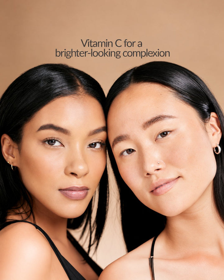 FERRULONIC C Vitamin C Serum by Aneskin – two women with dark hair and natural, even-looking skin, Vitamin C for a brighter-looking complexion